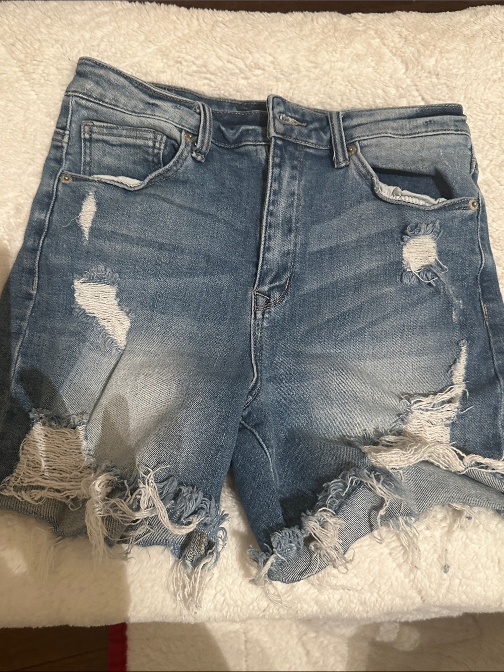 Distressed Light Wash Denim Cutoff Shorts